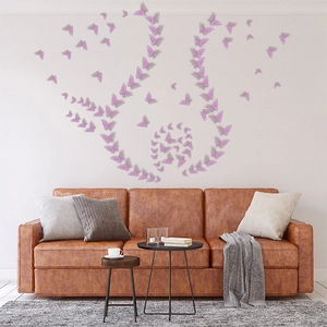 Modern 3D hollow purple butterfly wall stickers displayed on a living room wall