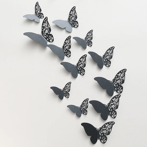 Detailed 3D hollow laser-cut butterfly wall stickers in black and grey for home decor