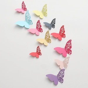 Detailed macro view of 3D cutout butterfly wall decals with double-layered wings