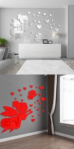 Detailed view of silver and red mirrored acrylic fairy heart wall stickers