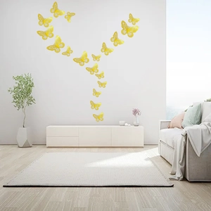 3D hollow golden butterfly wall stickers in flowing arrangement for modern home decor