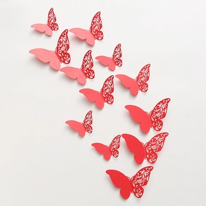 Detailed view of 11 pieces 3D red hollow pearl paper butterflies for wall decoration