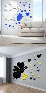 Detail of 3D mirror wall stickers featuring angel wings, hearts and stars for home decor