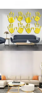 Detail of 3D acrylic mirror palm wall stickers showing yellow and blue reflective surfaces