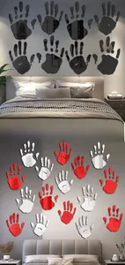 Detail showing acrylic mirror handprint wall stickers in black and red for Halloween decor