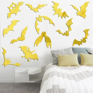 Detail of golden acrylic bat wall stickers with mirror effect for Halloween bedroom decor