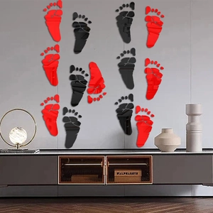 Modern wall decor featuring red and black mirror footprint acrylic stickers for home