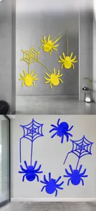 Mirror acrylic spider and web wall decals shown in yellow and blue for Halloween decor
