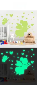 Glow-in-the-dark angel heart wall stickers for kids room showing day and night visual effect