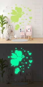 Luminous heart and angel wall stickers showing day and night glowing effect in a kids room