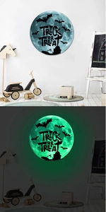 Luminous Halloween wall sticker showing trick or treat text and bats in day and night view