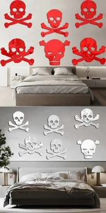 Modern wall decor set showing silver and red acrylic skull mirror stickers in a bedroom