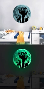 Luminous Halloween wall sticker showing spooky moon, bats and pumpkin in dark and light rooms