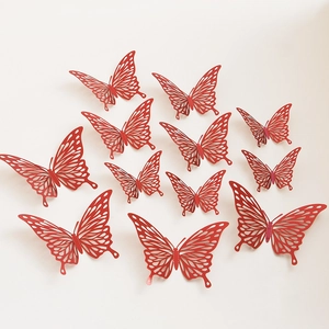 Lot de 12 stickers muraux papillons 3D rouges ajourés avec motifs découpés au laser