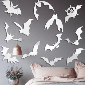 3D acrylic mirror bat wall stickers for Halloween home decor on a dark gray wall