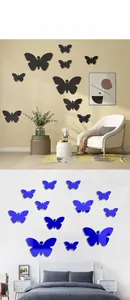 Black and blue acrylic mirror butterfly wall stickers displayed in bedroom and living room