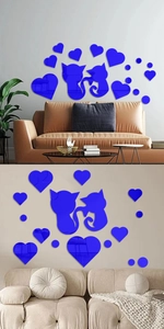 Blue acrylic cat and heart mirror wall stickers decorating a modern living room