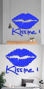 Detail of blue acrylic mirror wall sticker featuring Kiss Me text and lip design