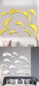 Golden and silver dolphin acrylic mirror wall stickers displayed in home living room settings