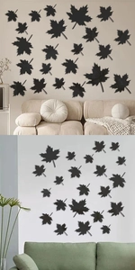Détail des stickers muraux en acrylique en forme de feuille d'érable noire pour le salon