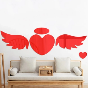 3D red mirror acrylic wall sticker featuring a heart with angel wings for home decoration