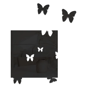 Detailed view of butterfly wall stickers featuring black and white hollow acrylic designs