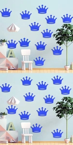 Detail of bright blue crown mirror wall stickers in a minimalist children bedroom setting