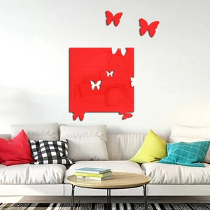 Modern red mirror butterfly wall stickers for living room decor over a white sofa