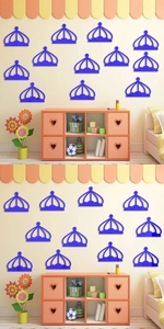 Detailed view of blue acrylic crown mirror wall stickers in a modern nursery setting