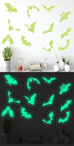 Luminous bat wall stickers showing glow-in-the-dark effect for Halloween home decor
