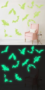 Detailed comparison of glow-in-the-dark bat wall stickers in day and night settings