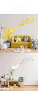 Detailed view of bubble elephant acrylic mirror wall decals in gold and silver finishes