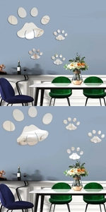 Modern set of acrylic dog paw mirror wall decals showing reflective surface for home decor