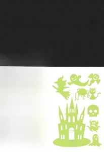 Detail showing glowing Halloween wall stickers with bat pumpkin and ghost silhouettes