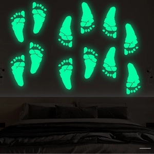 Stickers muraux empreintes de pas lumineuses vertes pour chambre d'enfant