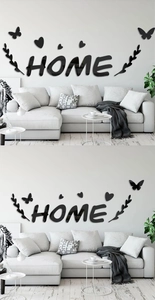 Close-up of black 3D mirror HOME wall stickers with butterfly and heart decor