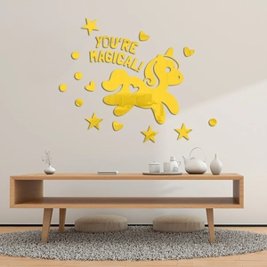 Detail of yellow acrylic mirror wall stickers with magical unicorn and star elements