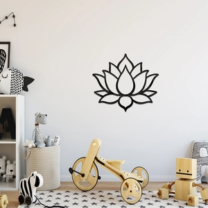 Close-up of a black acrylic lotus mirror wall sticker in a cozy nursery room