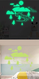 Glow in the dark mountain forest wall stickers showing day and night contrast effect