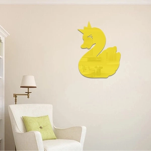 Detail of yellow swan mirror wall sticker with crown design for modern home decor