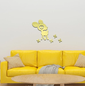 Detail view of golden acrylic mirror deer and flower wall stickers in a modern living room