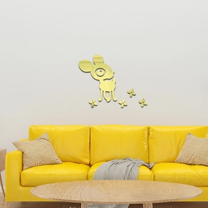Detail of golden acrylic deer mirror wall stickers in a modern nursery living room
