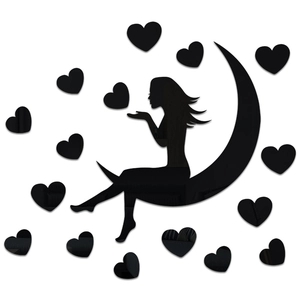 Detail of DIY acrylic mirror wall sticker with girl on moon and black heart decals