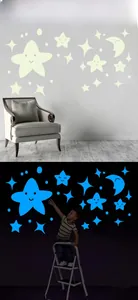Luminous glow-in-the-dark stars and moon wall stickers with blue fluorescence effect