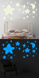 Luminous glow-in-the-dark stars and moon wall stickers showing blue fluorescence in baby room