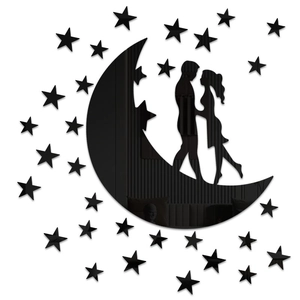 Detail of black acrylic mirror wall stickers featuring crescent moon and couple silhouettes