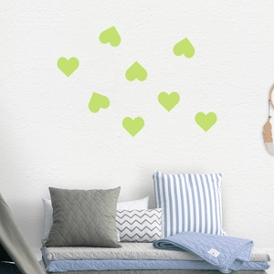 Luminous heart-shaped wall stickers in fluorescent green glow for kids' bedroom decor