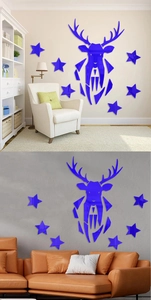 Macro detail of the dark blue mirror acrylic deer head and star 3D wall stickers