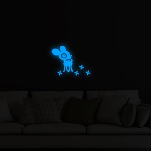Luminous blue cartoon deer and flower wall stickers glowing in a dark room setting