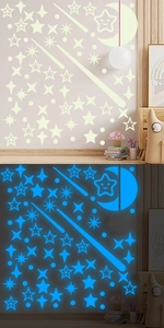 Luminous wall stickers set showing day and night glowing effect in children's bedroom